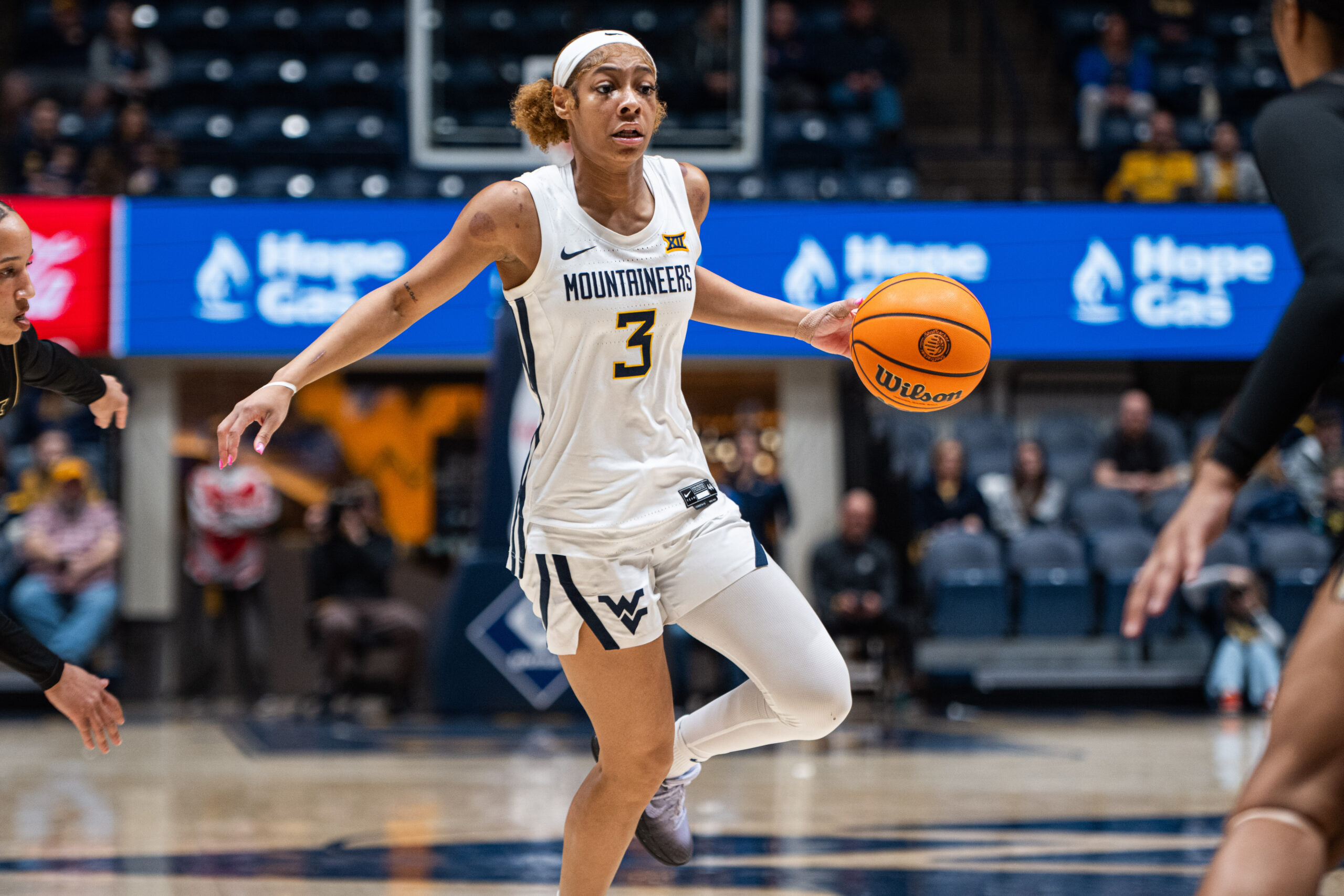'Old' Cooke a hit as a new leader for WVU women's hoops team